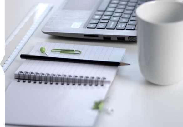 Close-up view of a desk with various office supplies