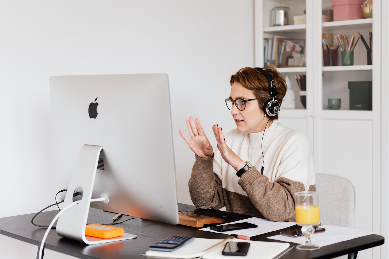 person on phone at desk