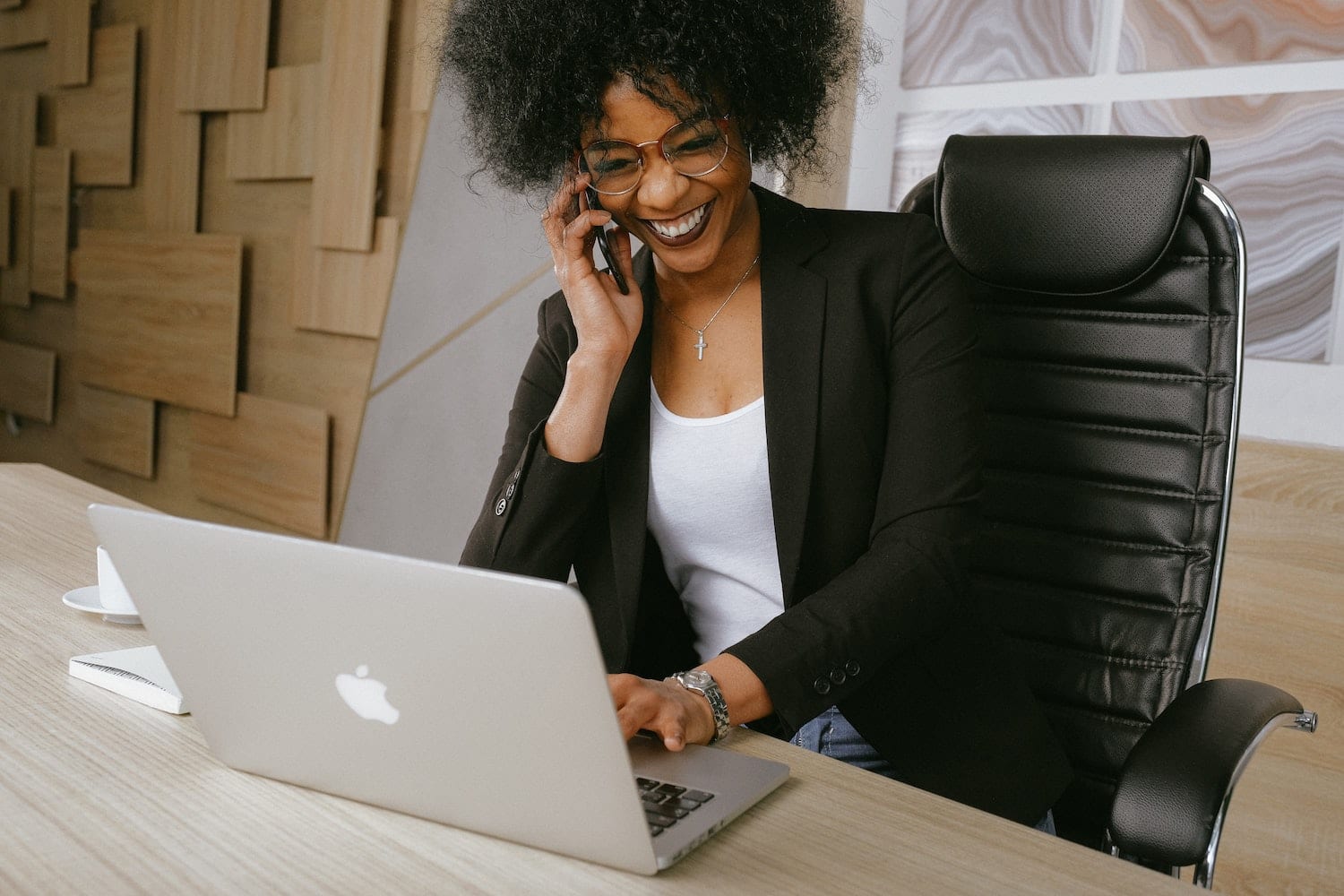 woman on phone and computer