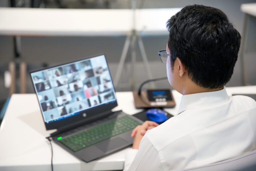 Business man use computer for meeting team with video call program.