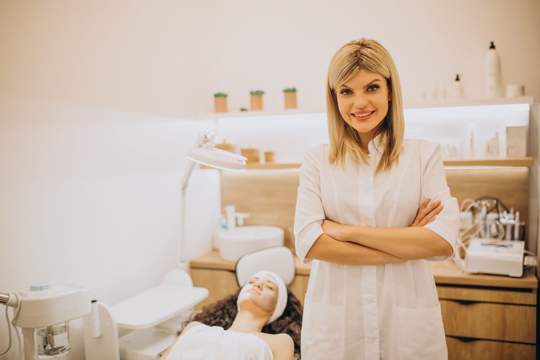 Woman visiting cosmetologist and making rejuvenation procedures