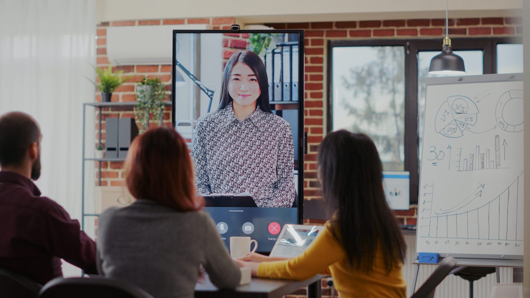 diverse team attending online video call meeting with colleague talking about business collaboration growth development people using remote video teleconference boardroom scaled