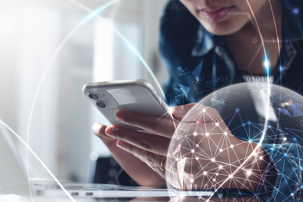 woman-holding-phone-next-to-abstract-globe