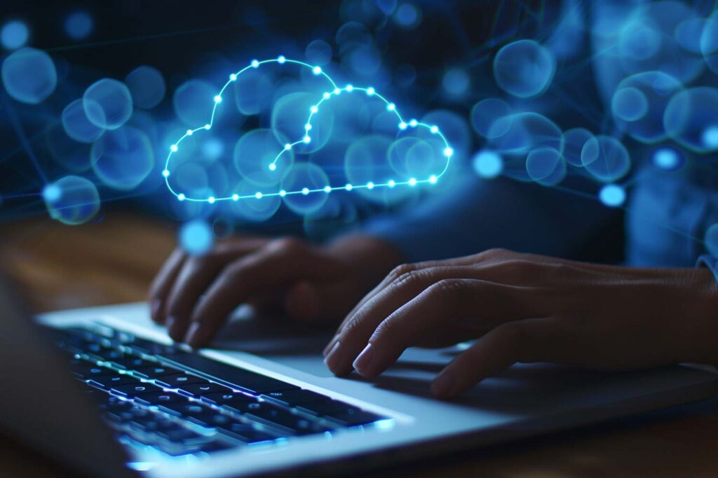 hands-on-laptop-working-with-tech-clouds-above
